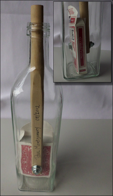 cards in a bottle image